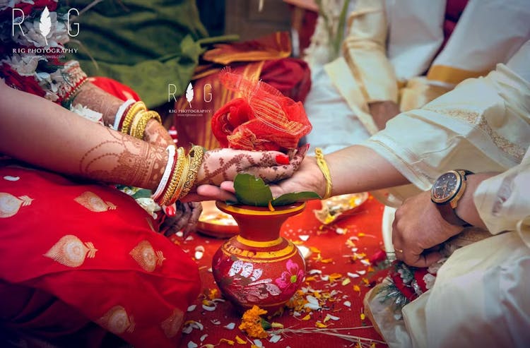 Pic of bride and grooms hand for hasta granthi