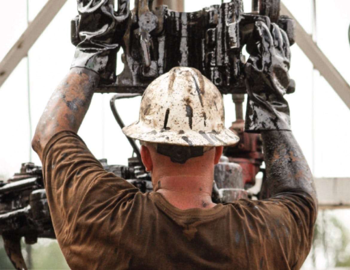 Directional driller preps the drill on an oil rig.