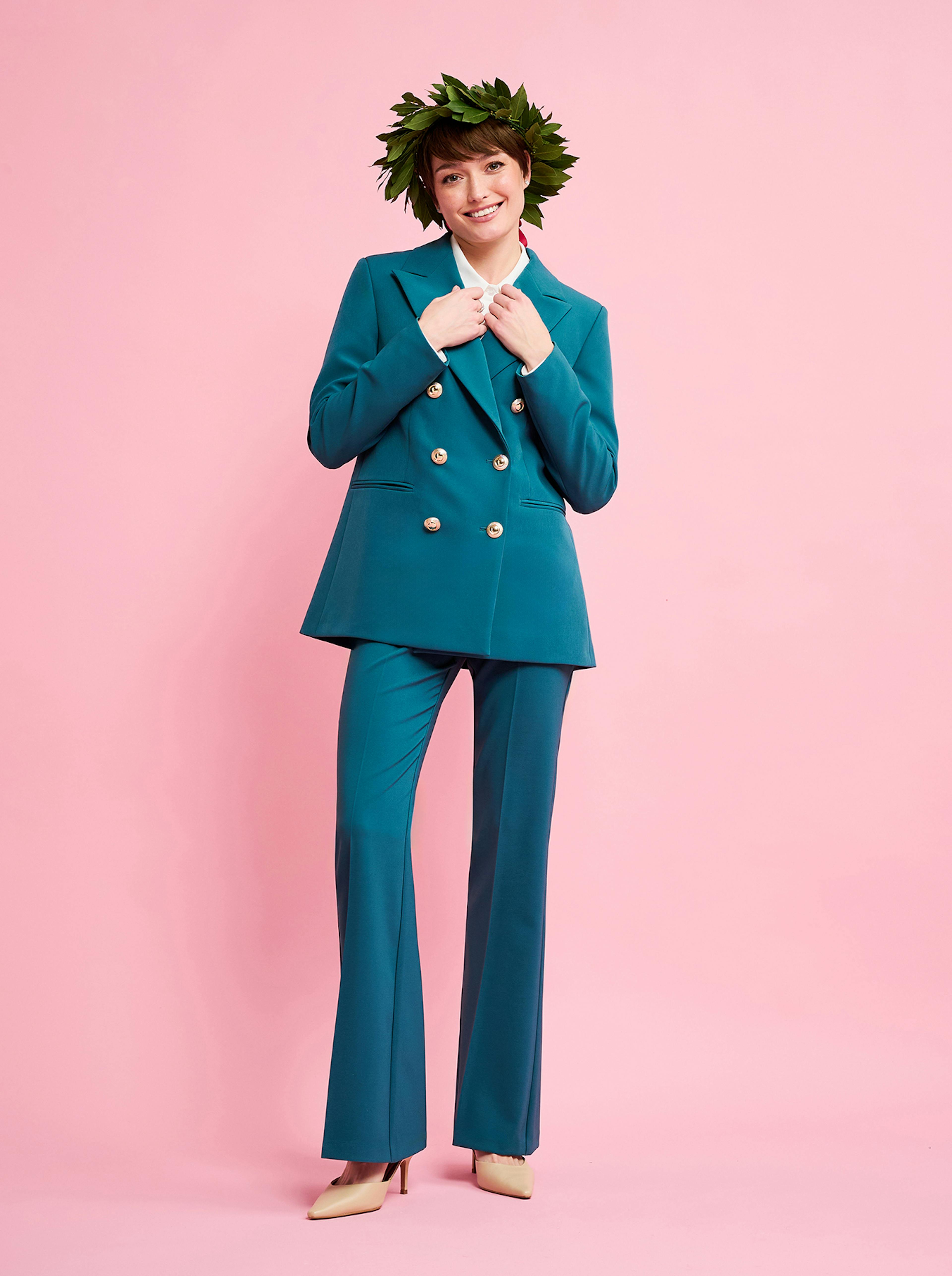 Girl with green Graduation Suit