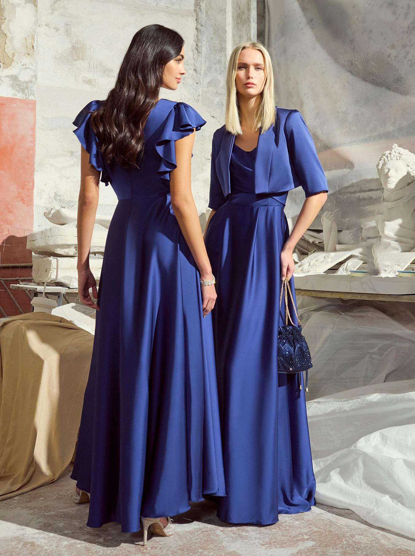 Two women in stunning blue dresses
