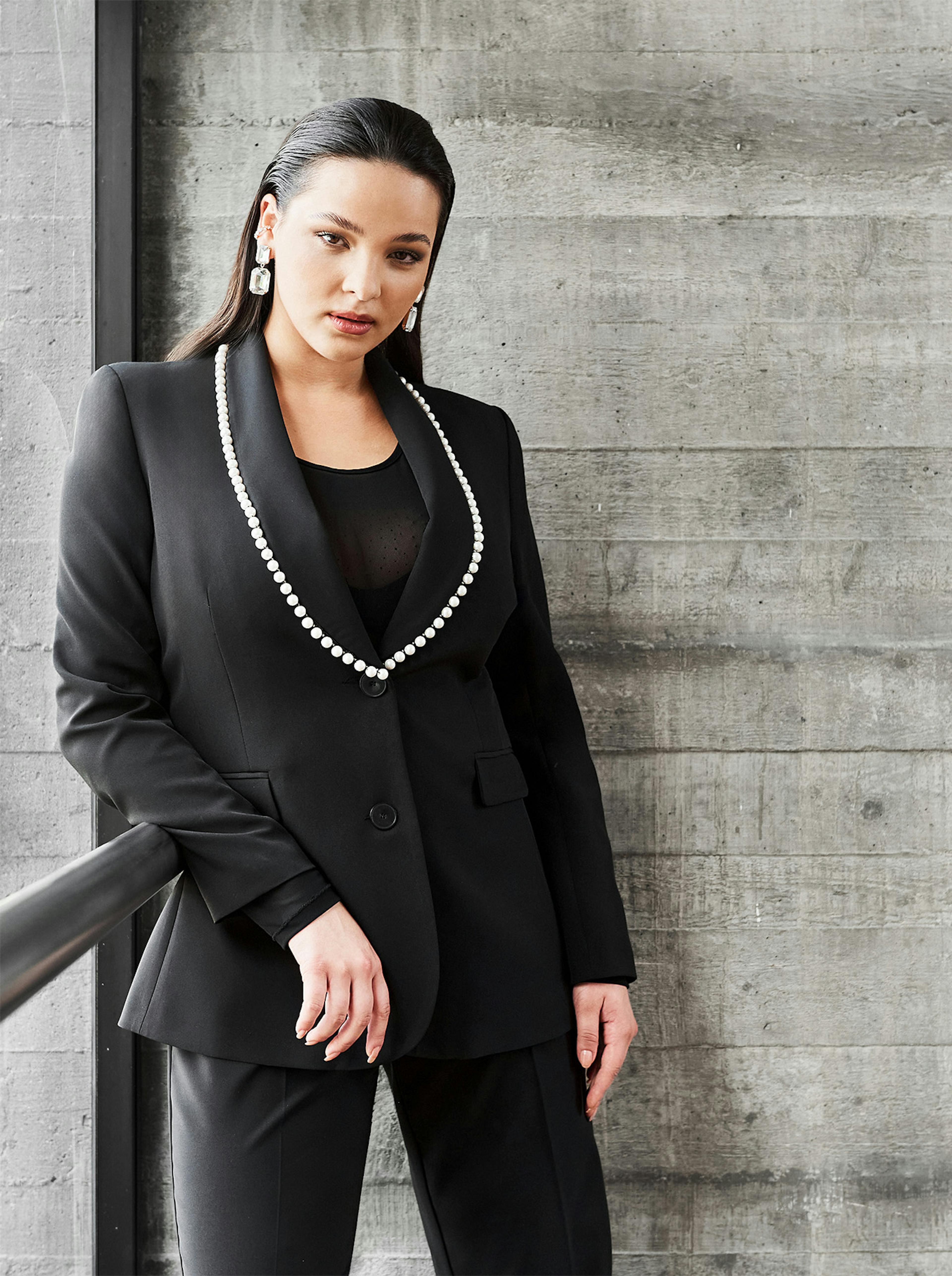 Curvy Model with Pearly black Suit