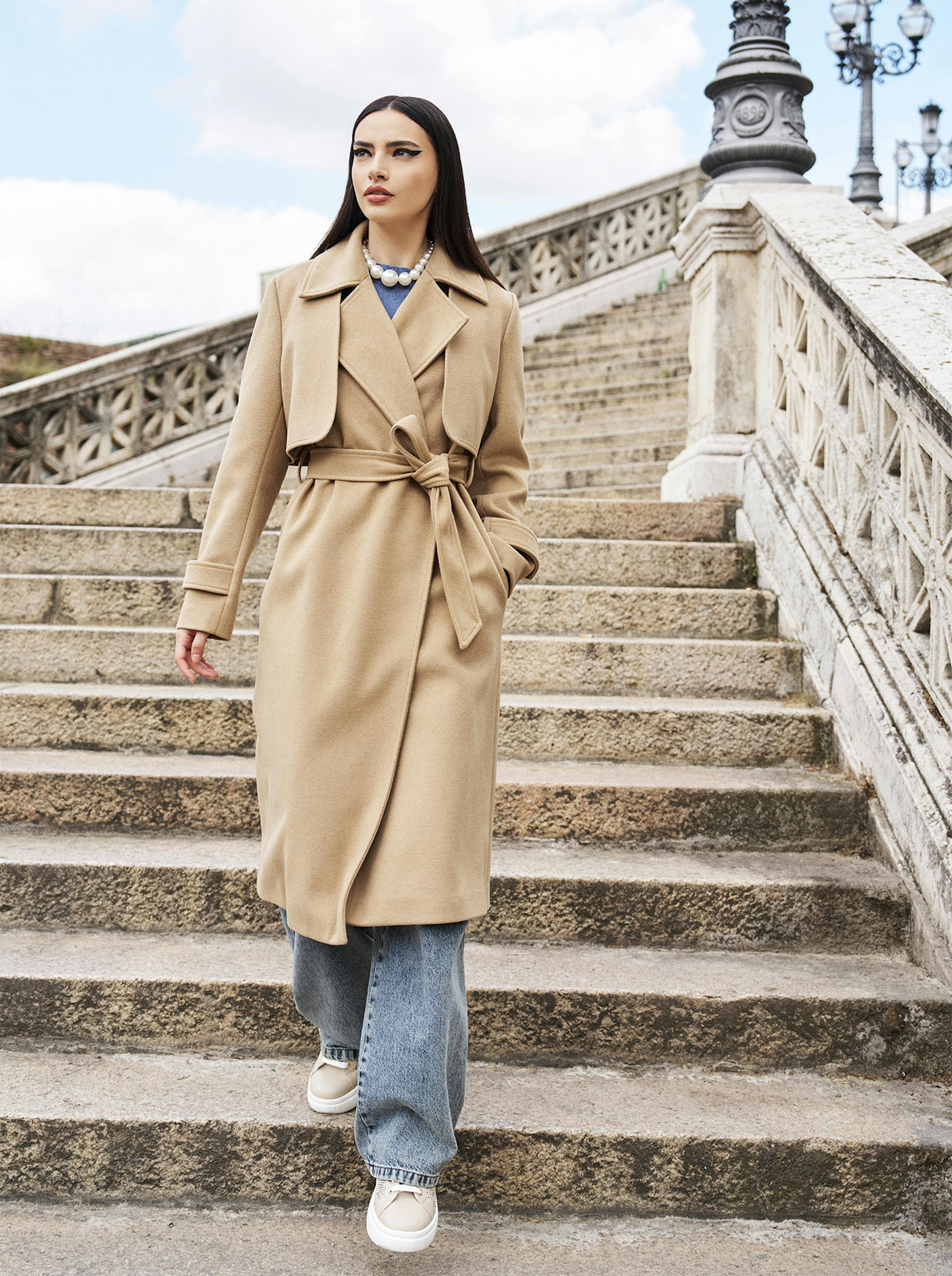 Model with beige coat