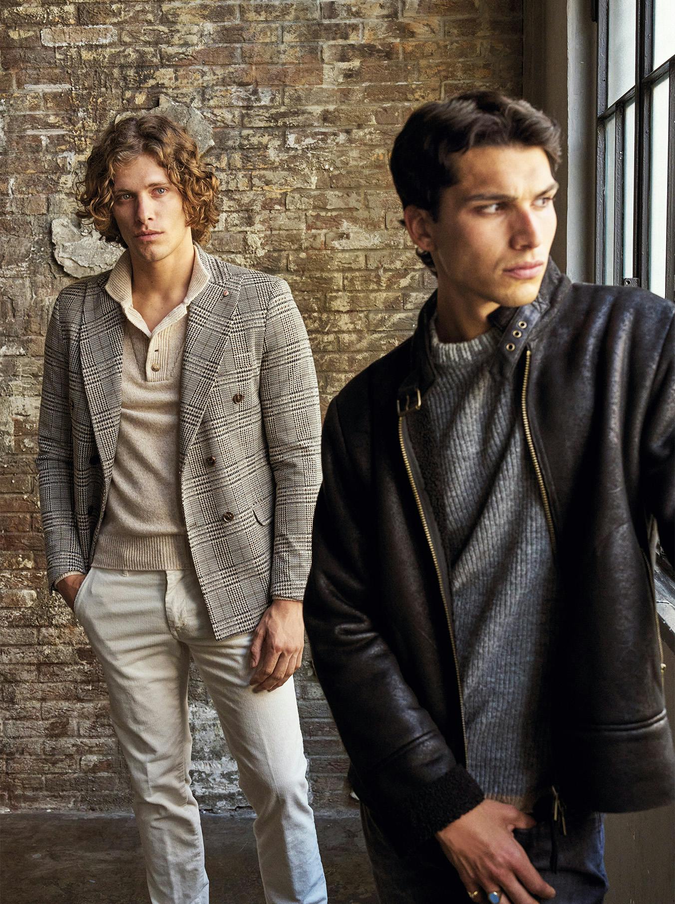 Two Men Model with elegant suit and biker jacket
