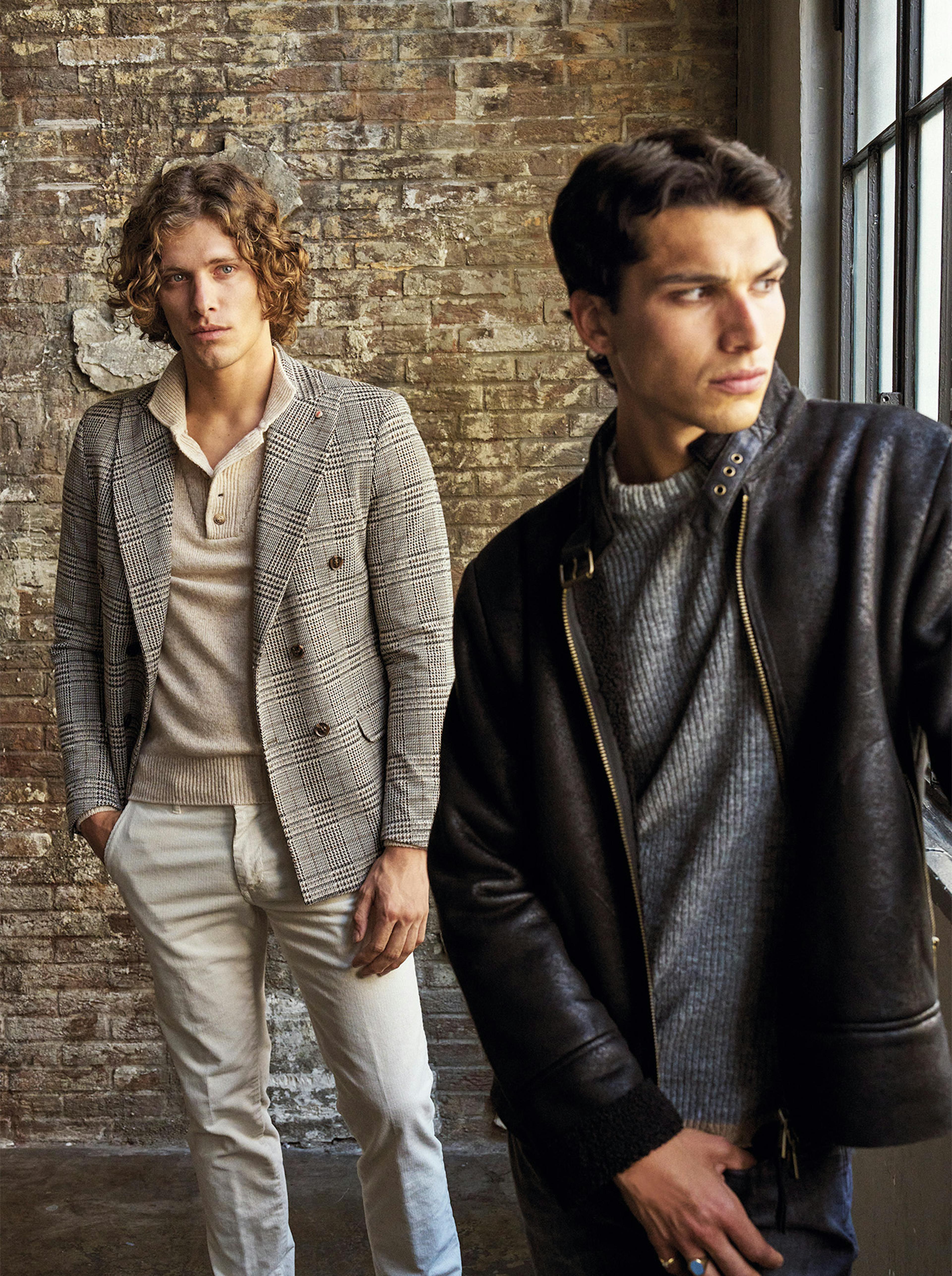 Two Men Model with elegant suit and biker jacket