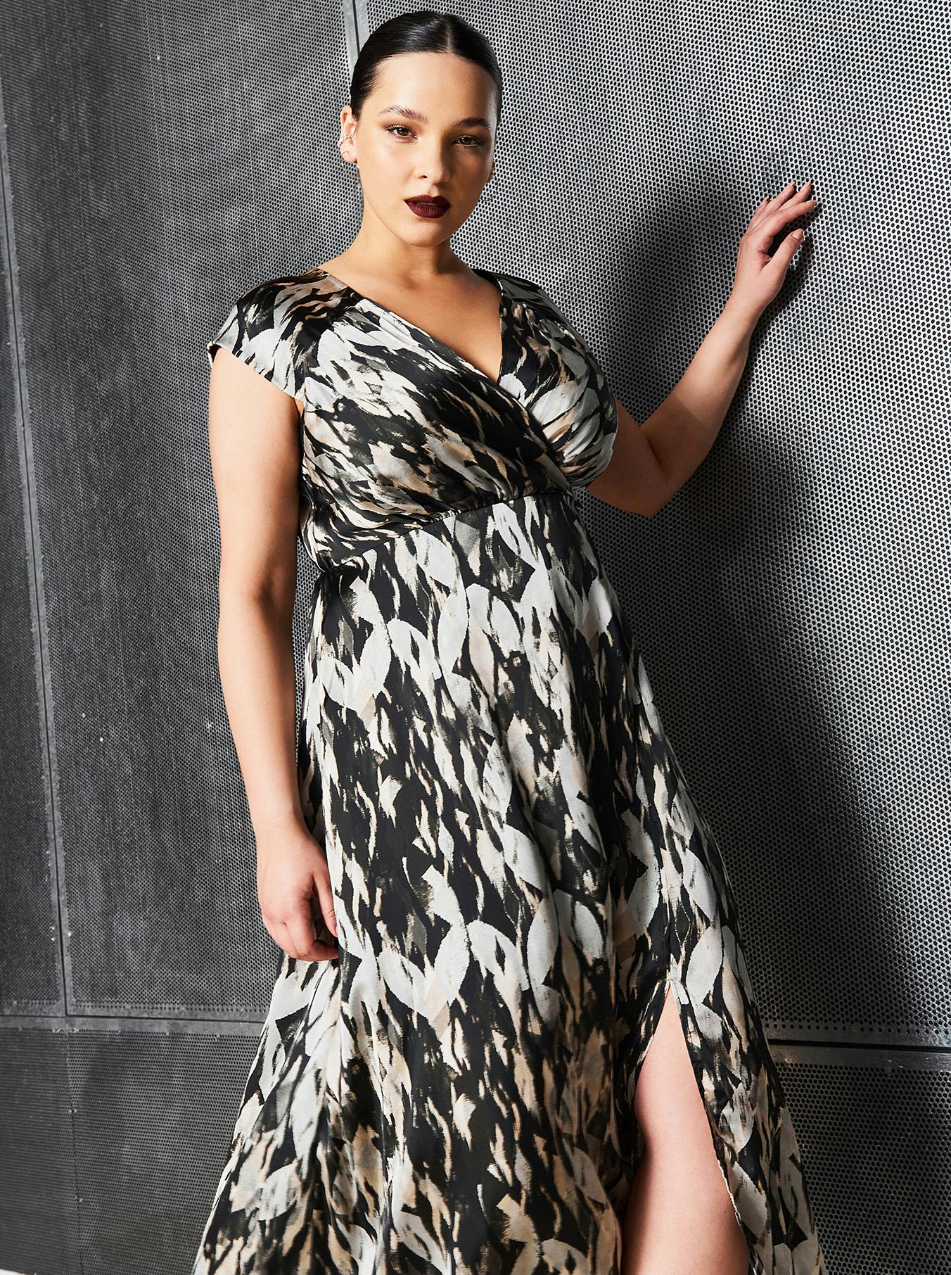 Model with black and white printed dress