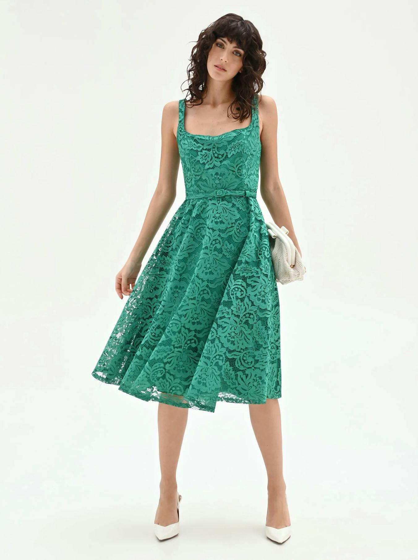 Emerald green floral lace midi dress with square neckline and A-line skirt. Elegant sleeveless lace dress for weddings or summer ceremonies.