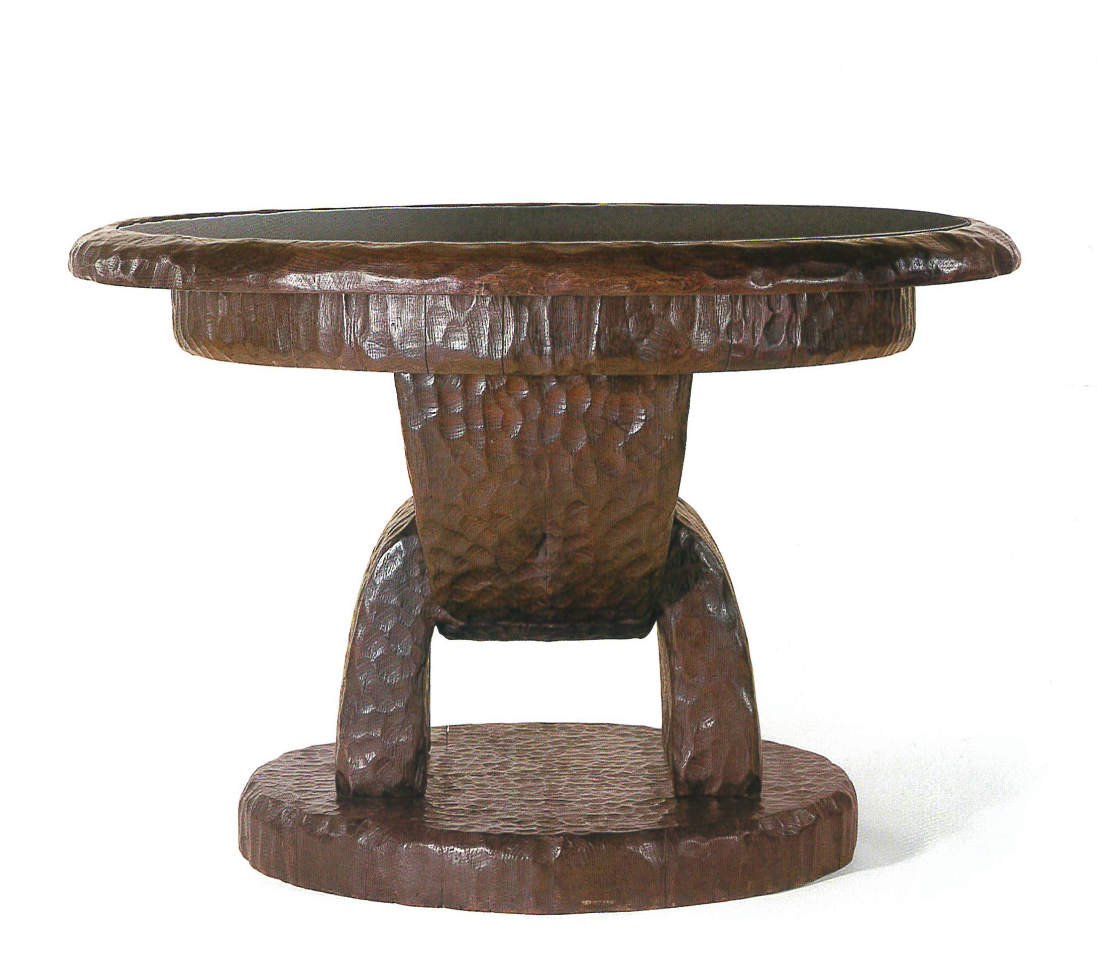 Table by Marcel Coard in oak with a ceruse patina and carved with an adze © Sotheby's Paris