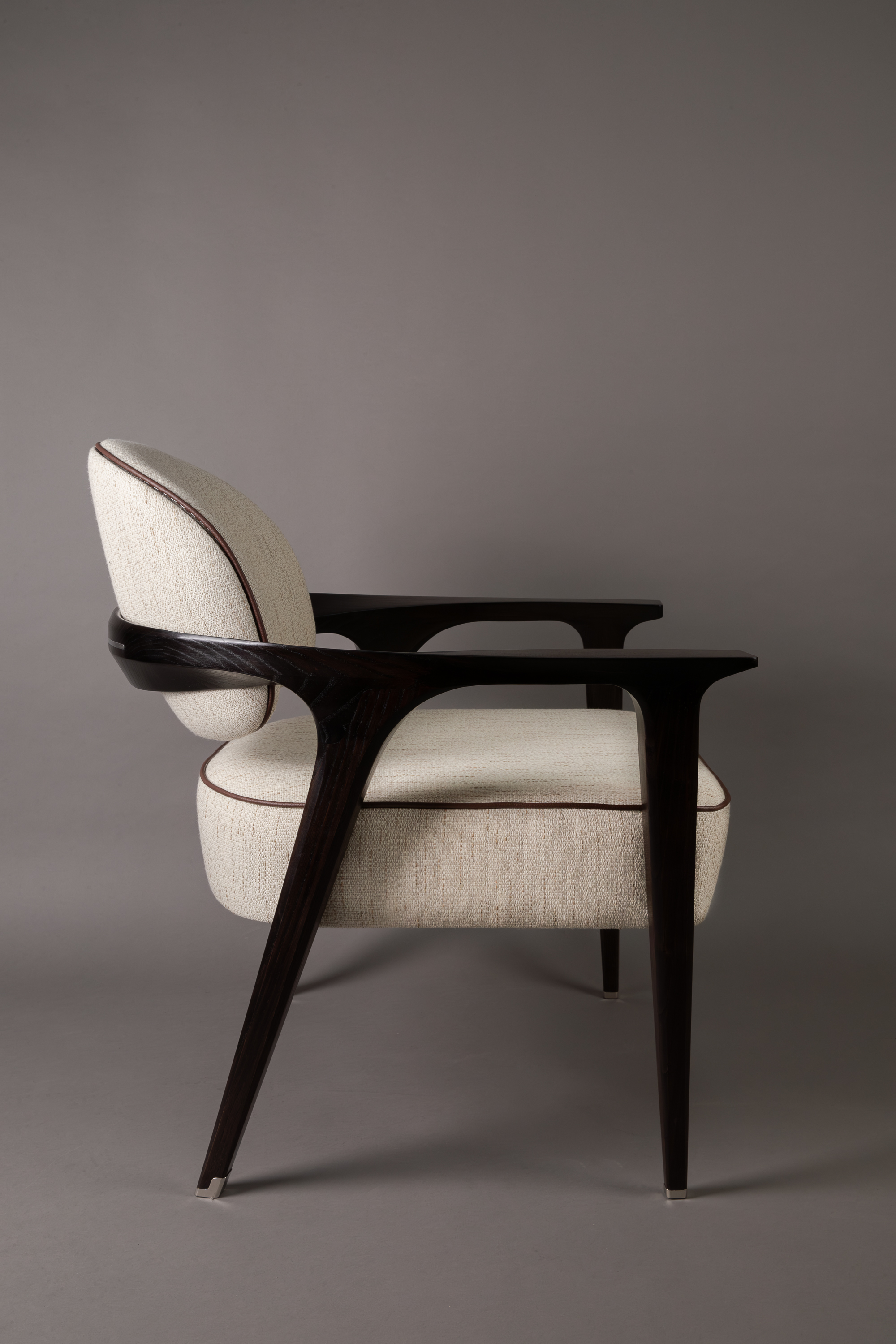 Lounge chair - structure in satin dark brown chestnut wood - upholstery made by Kenzo Takada K3 ©Gaspard Hermach/RINCK