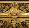 Louis XIV-style marquetry and gilded bronzes with delicate scrolls, by André-Charles Boulle. © The Jack and Belle Linsky Collection, 1982 / THE MET