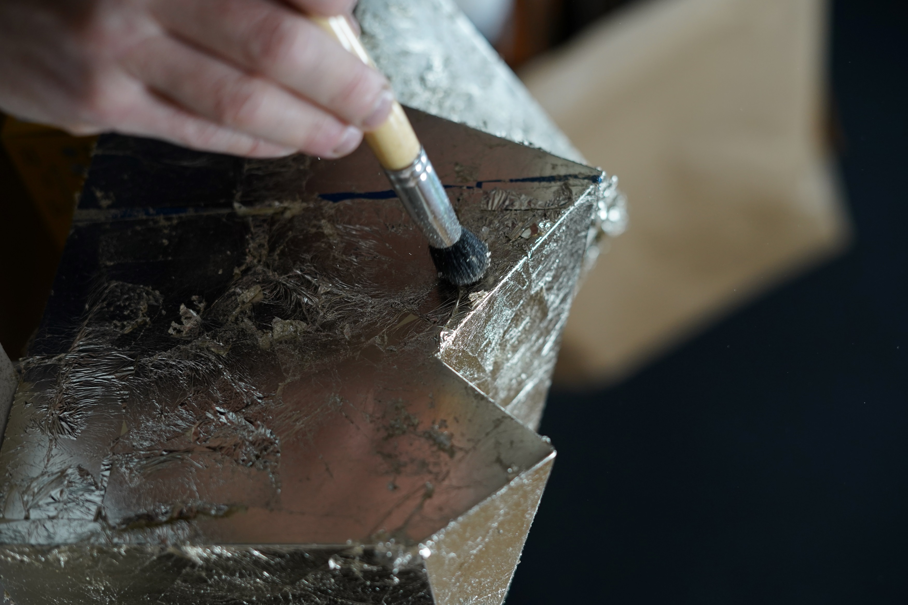 Gilding of the fireplace