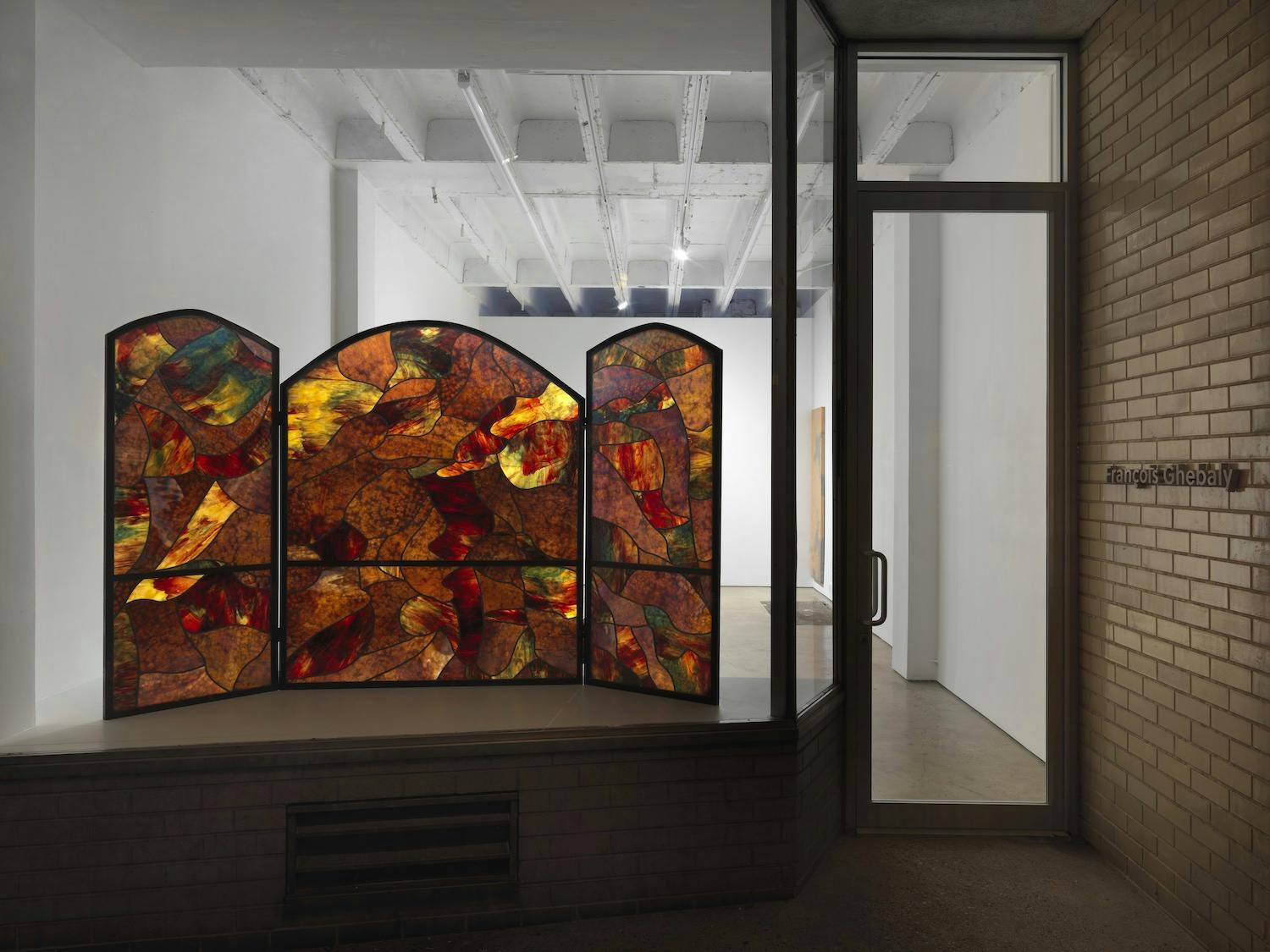 Where does the tongue lead the food (screen), 2022. Stained glass, patinated steel frame. 60 x 96 x 24 in. (152.40 x 243.84 x 60.96 cm)