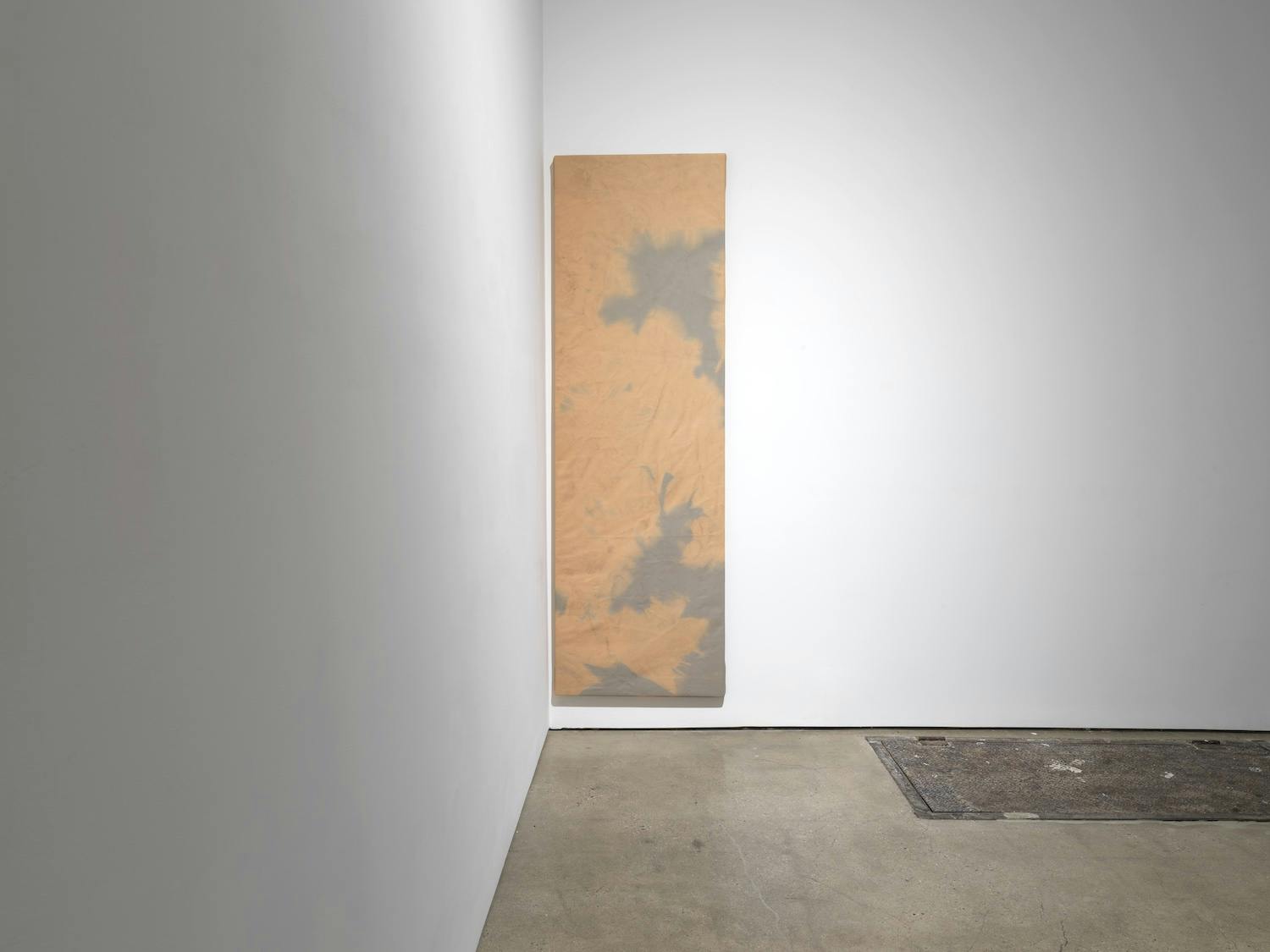 As nearly like the day., 2022. Leather and bleach. 89 x 28 inches (226 x 71.5 cm.)
