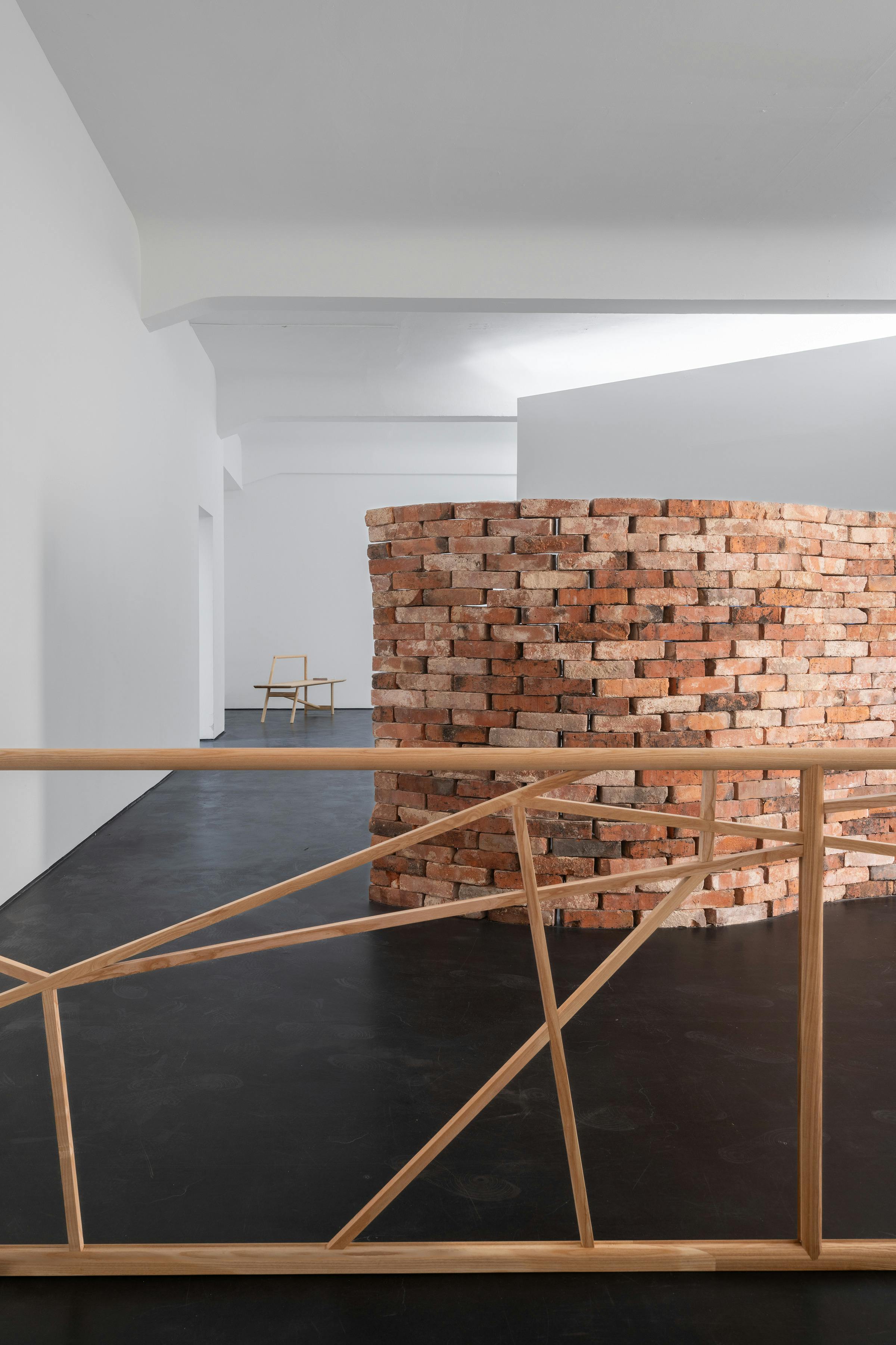 Foreground Fruit  of the poisonous tree, Higher and more free! The music must always  play, All the conventions conspire to make this fort assume the  furniture of home; Lest we should see where we are, higher and more  free! Lost in a haunted wood, What are the consequences of two different  forms interacting? Ice on a bed of mint leaves. That’s what I thought  in the early morning. Higher and more free! Breeze engine. If no is what  it is then that’s what it is. Breeze Engine. Paint dries on walls.  Bells chime at noon. Rivers flow through canyons. Enough. Enough.  Enough. Enough. Enough., 2023                              Ash wood 420 x 67.5 x 16.5 cm
 165 3/8 x 26 5/8 x 6 1/2 inches