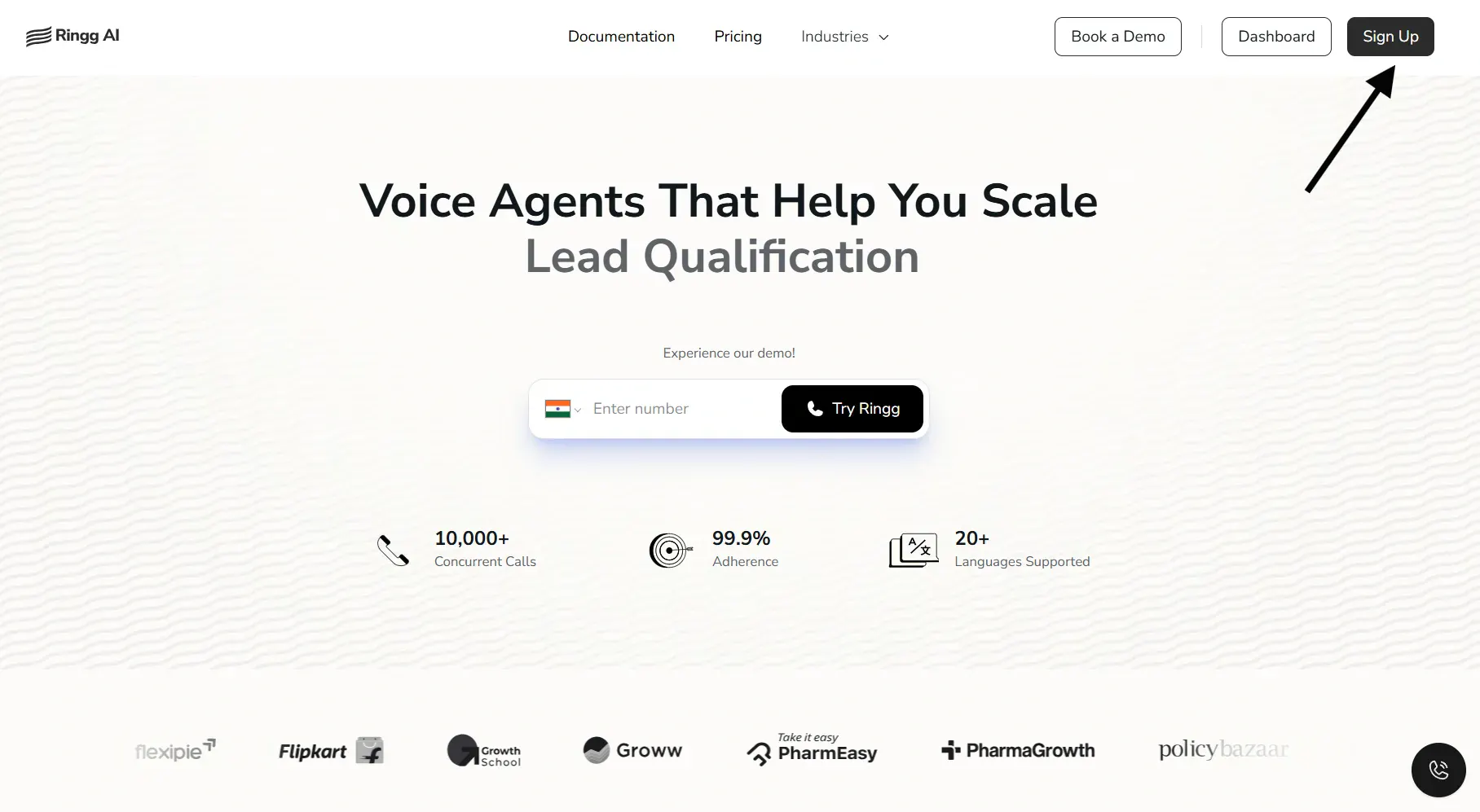 Ringg AI homepage with a sign-up button