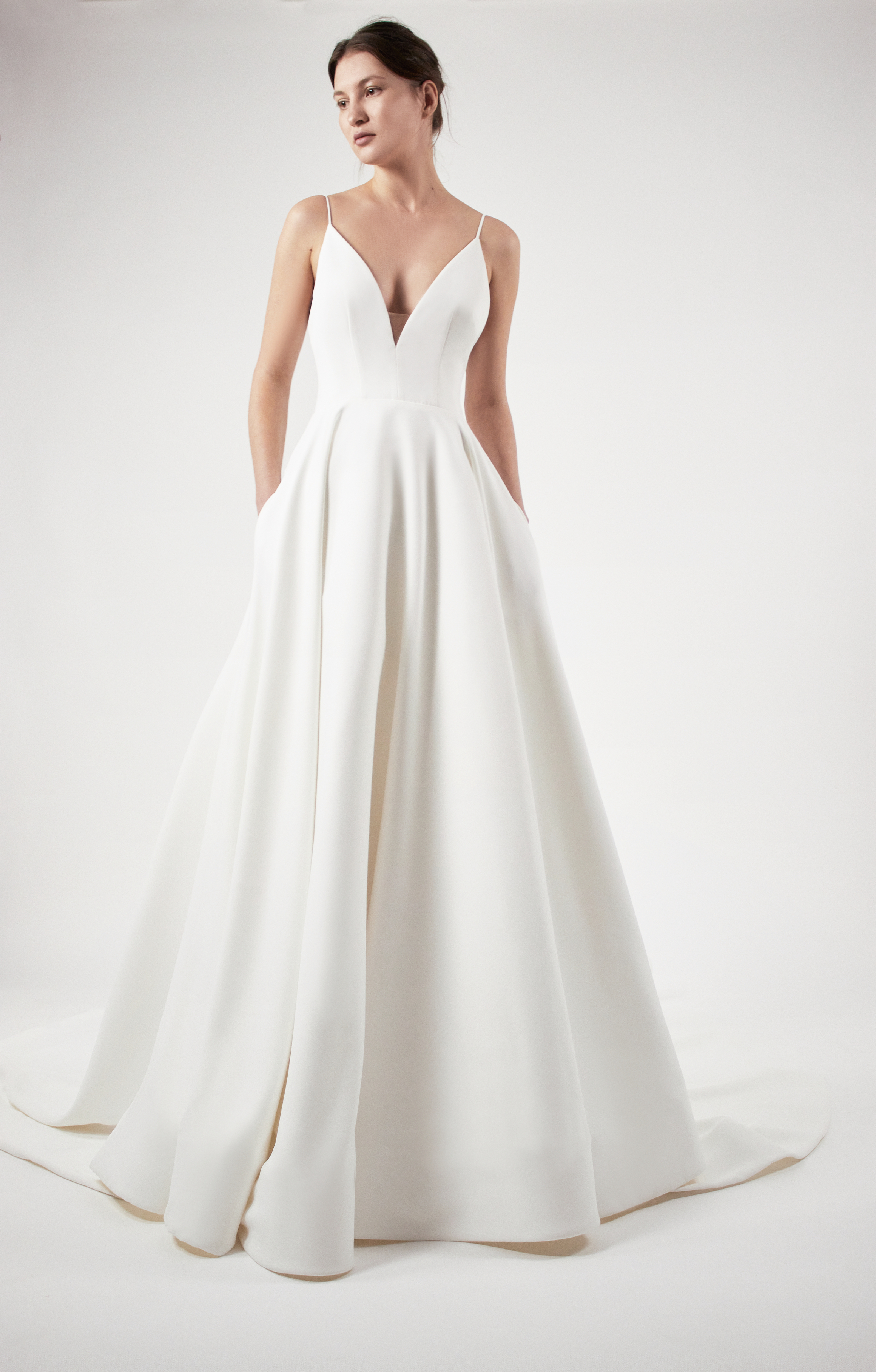 Layla ivory crepe ball gown with deep V ballerina bodice, shown from the front.