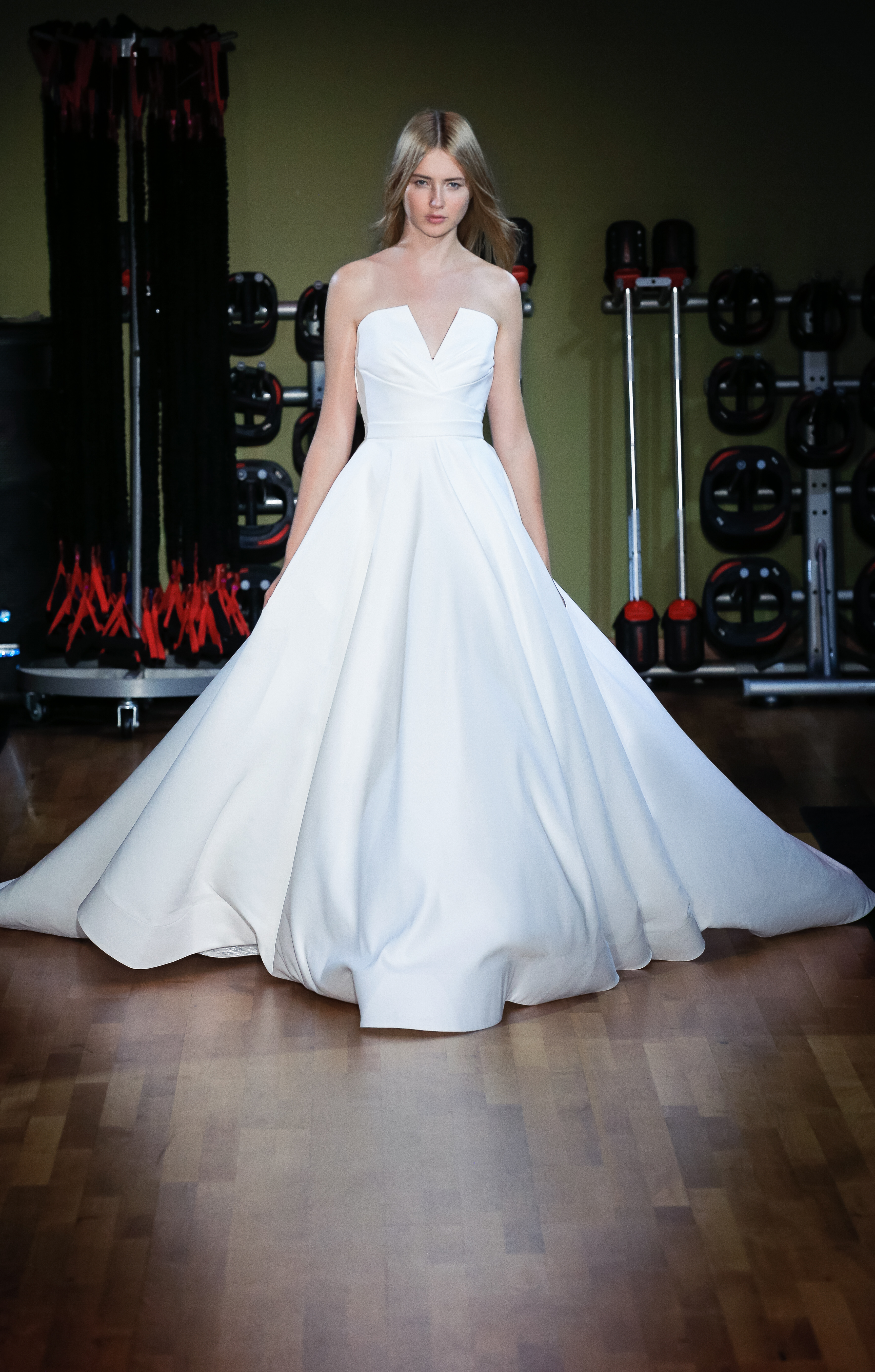 Camila matte satin ball gown with notched draped bodice, shown from the front.