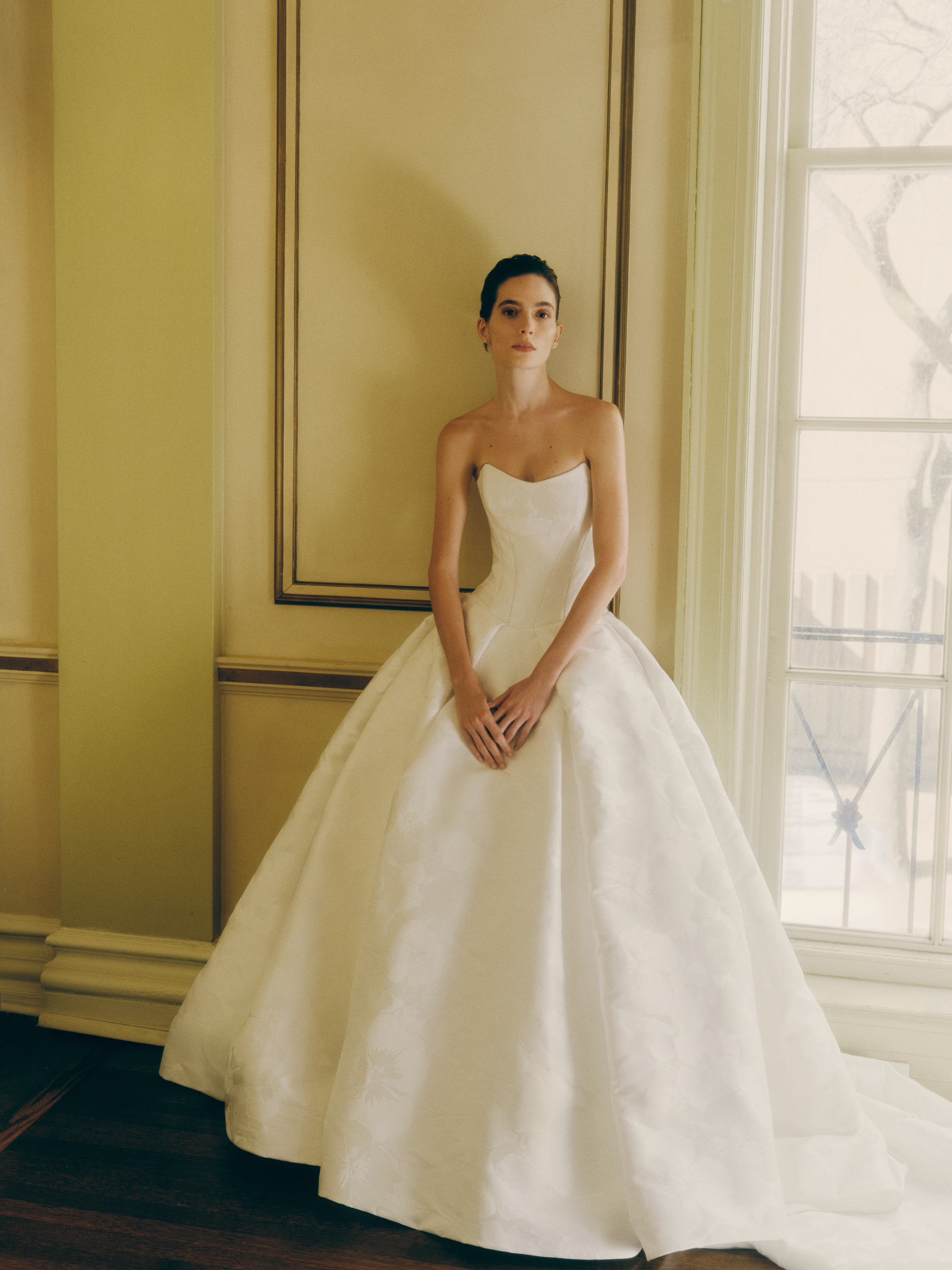 Bride wearing the Yates voluminous ballgown, showing the drop waist bodice and full pleated skirt.