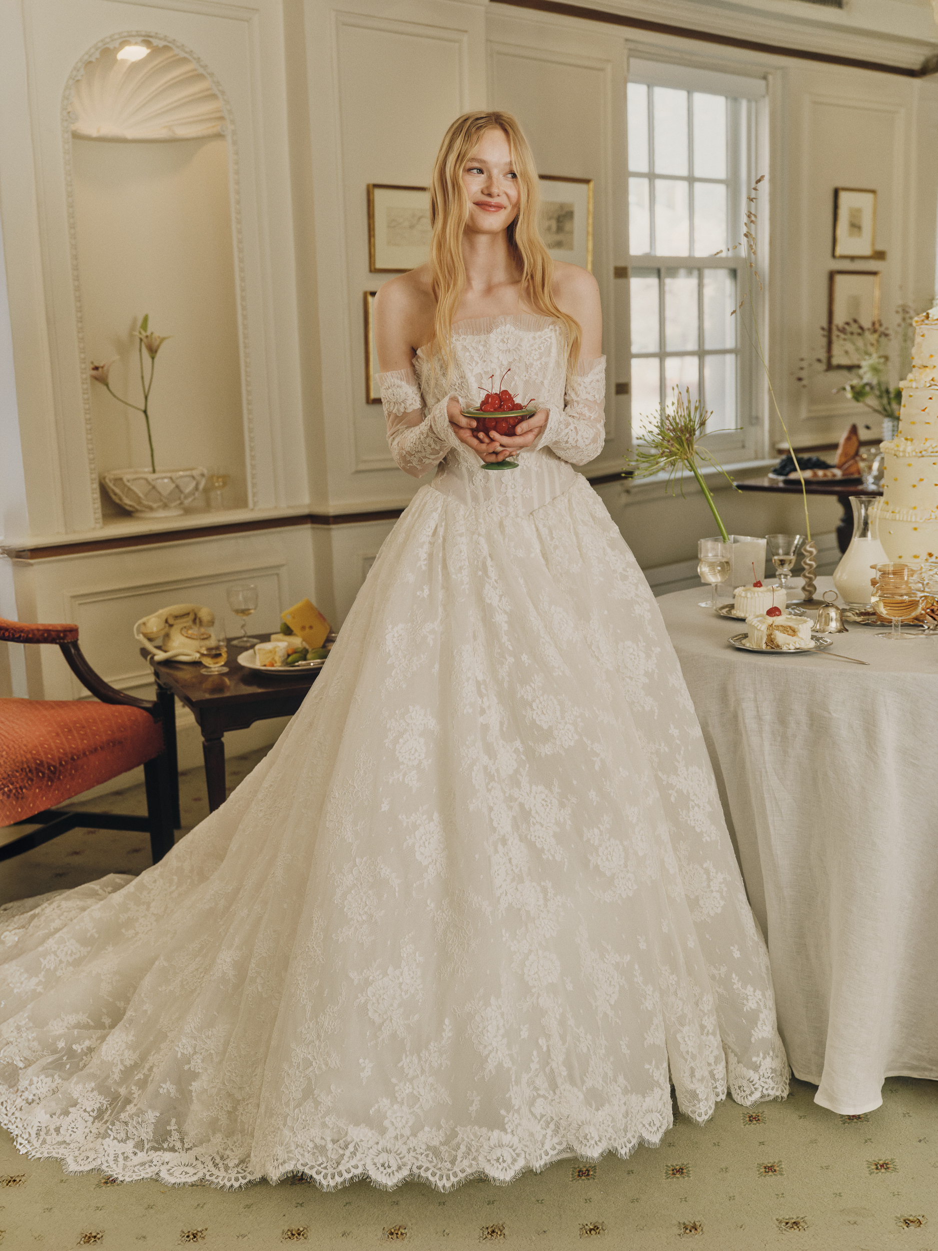 Full-length view of the Dawes lace ballgown with translucent bodice, micro-pleated tulle neckline, and full skirt.