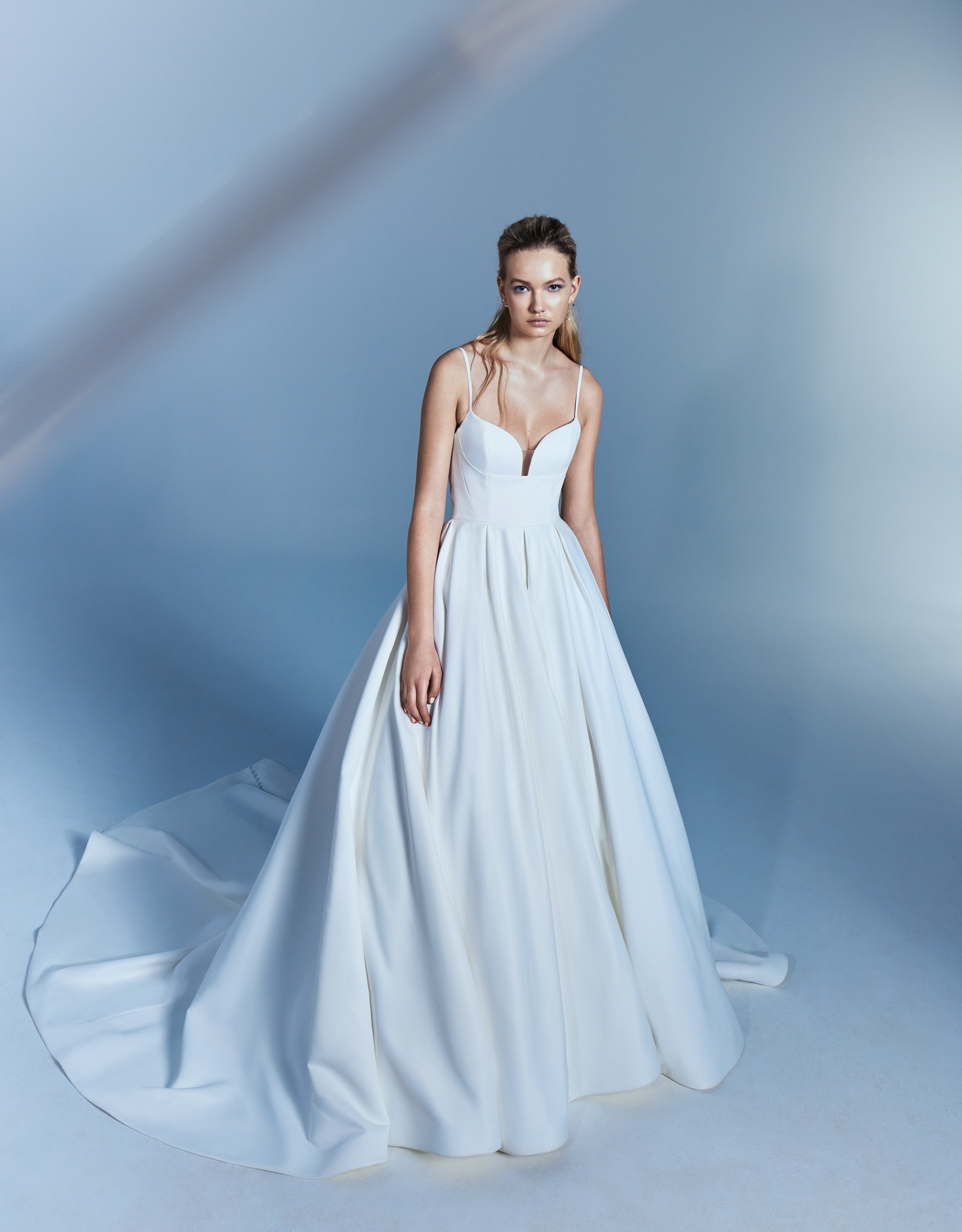 Lily pleated matte satin ball gown with ballerina spaghetti strap bodice and sheer back, shown from the front.