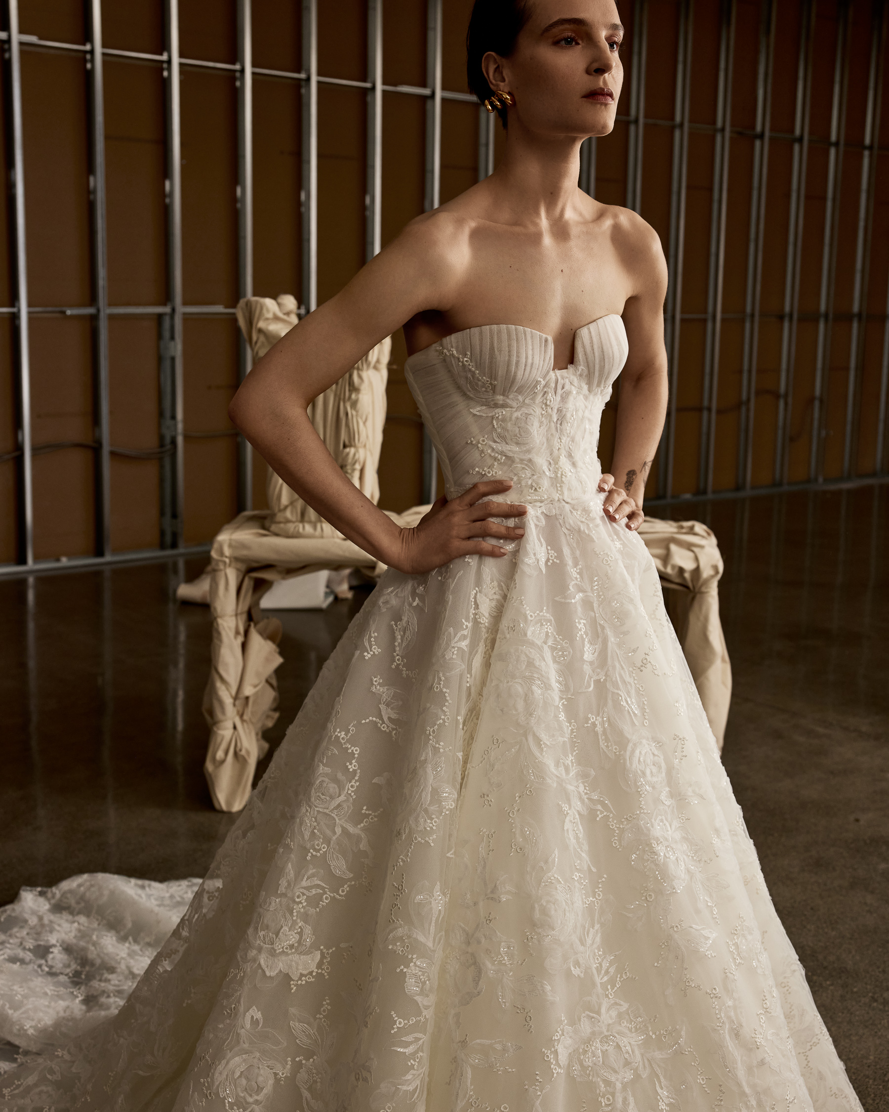 Close-up of Indigo gown showing the notched corset bodice and draped tulle detail.