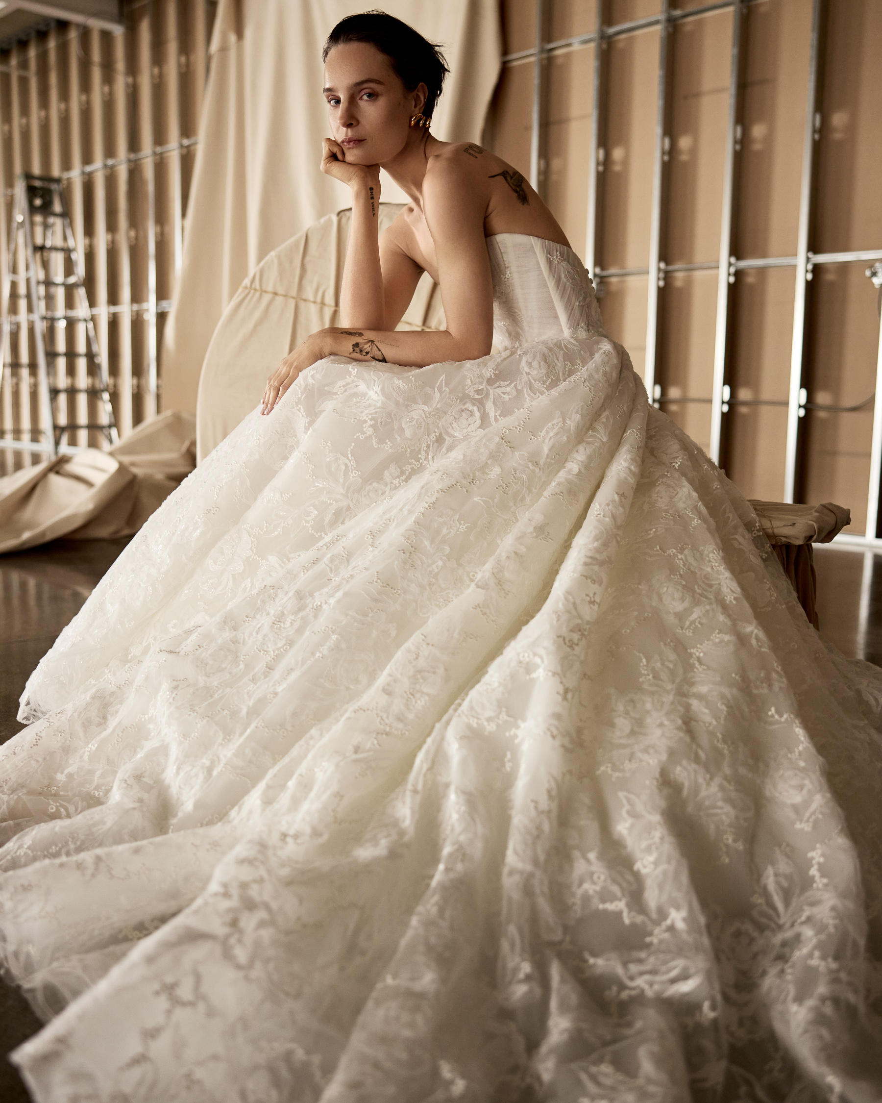Indigo diaphanous notched corset ball gown with draped tulle bodice detail, shown from the front.
