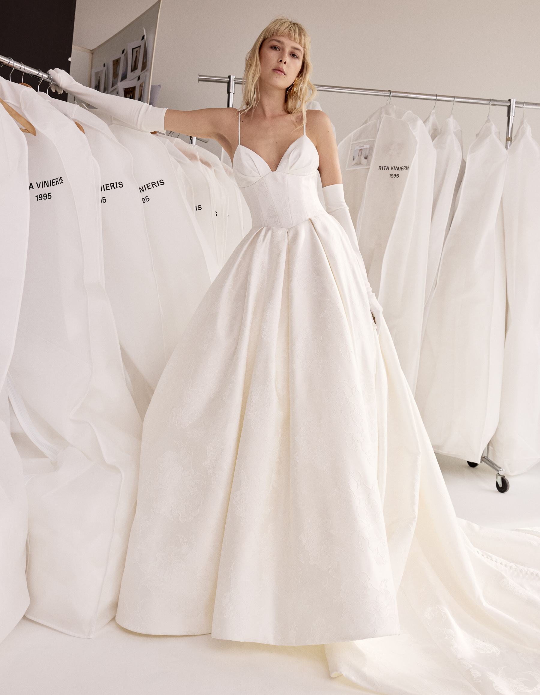 Hendrix jacquard ball gown with draped cups, basque waist, and buttons down the back, shown from the front.