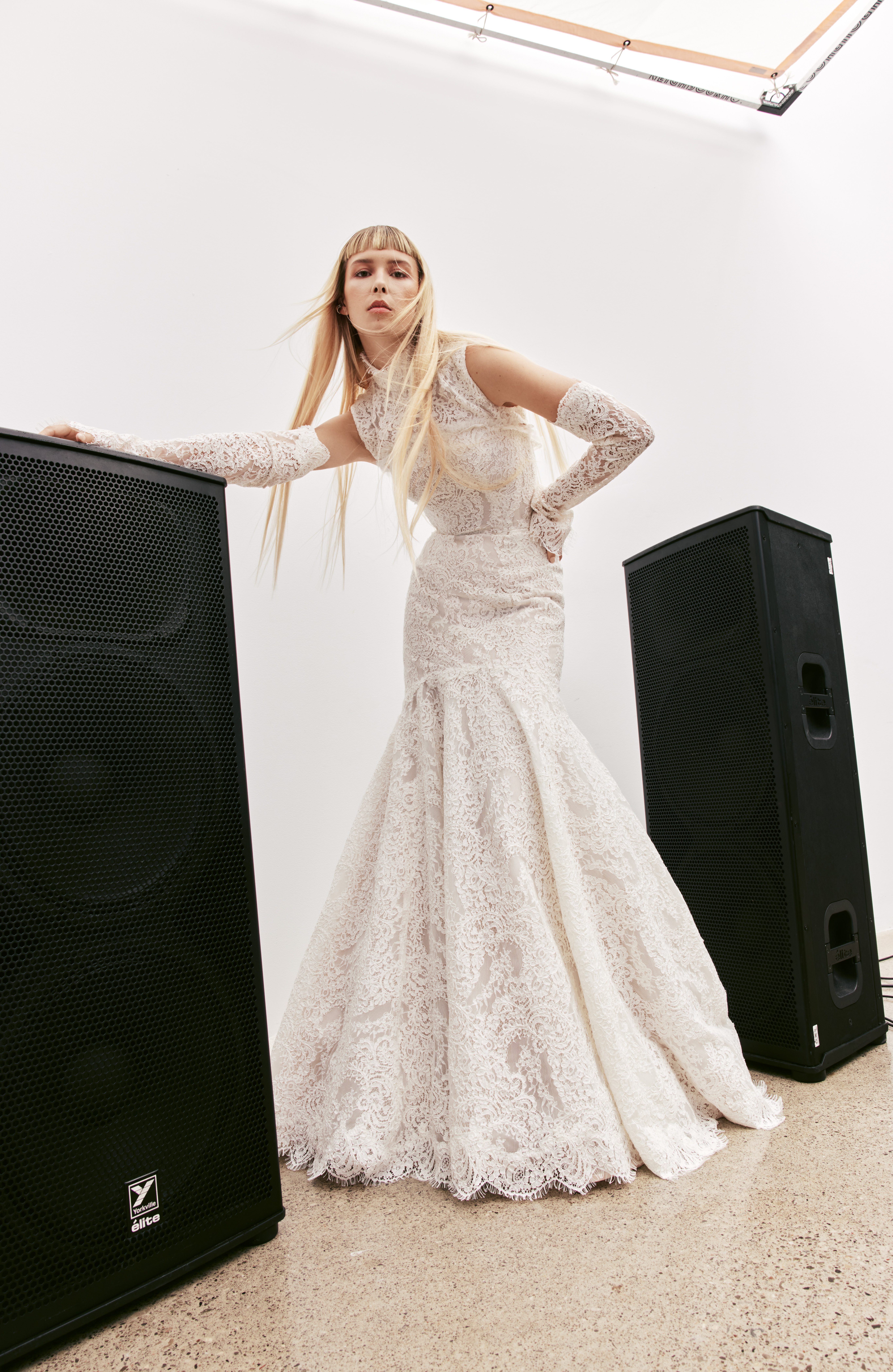 Kori corded lace convertible fit-and-flare gown with mock neck bolero, detachable sleeves, and full skirt, shown from the front.