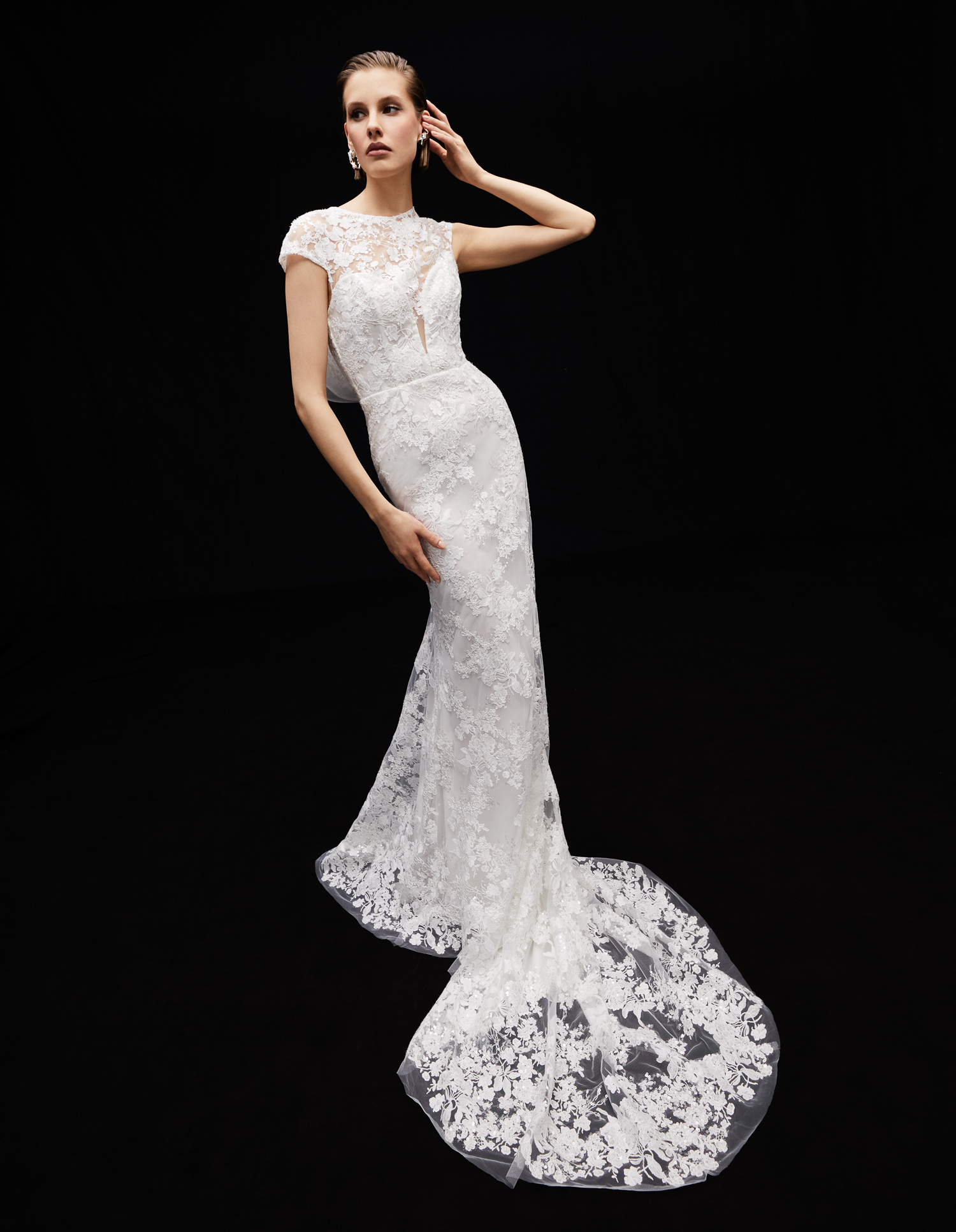 Ellie embroidered shimmer lace sheath gown with deep V neckline, flutter sleeves, and floral lace train, shown from the front.