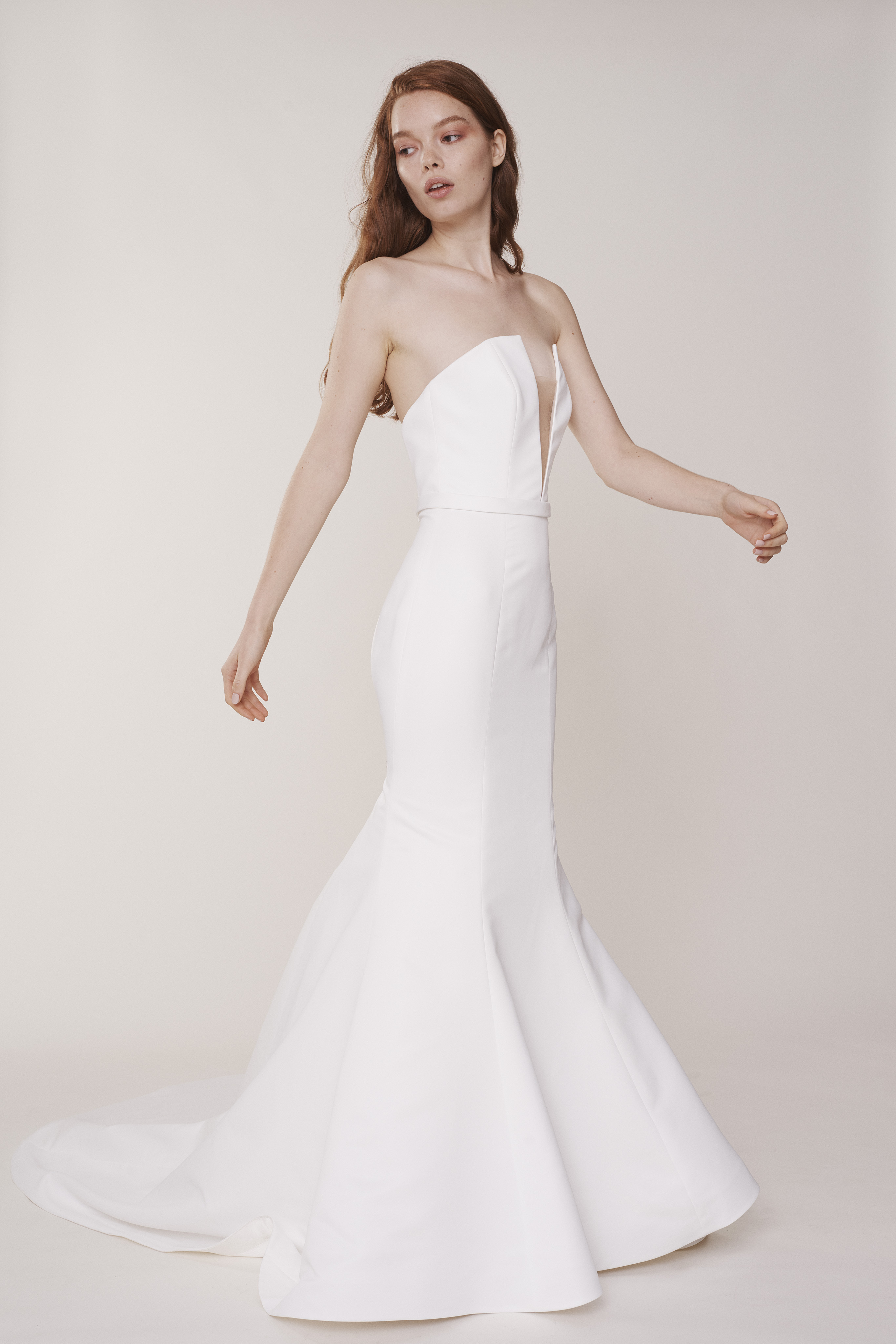 Windsor ivory matte satin flared gown with deep V neckline, shown from the front.