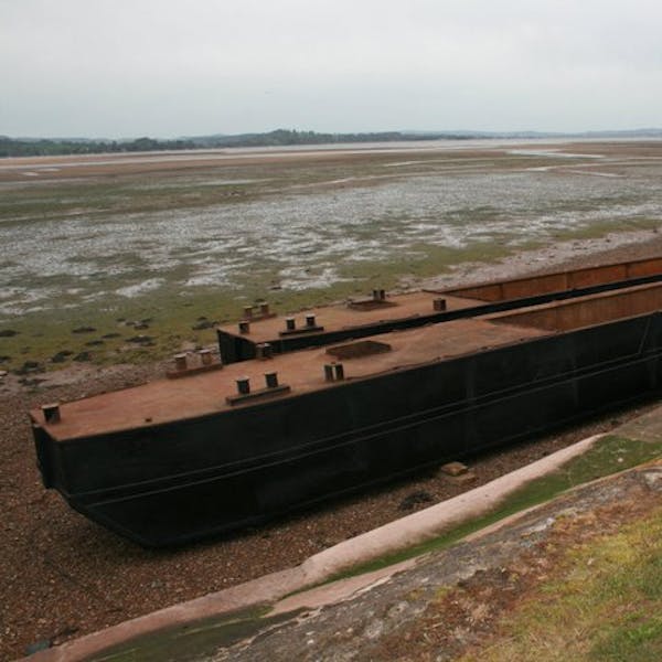 The bare barges after delivery beached in Exmouth gut
