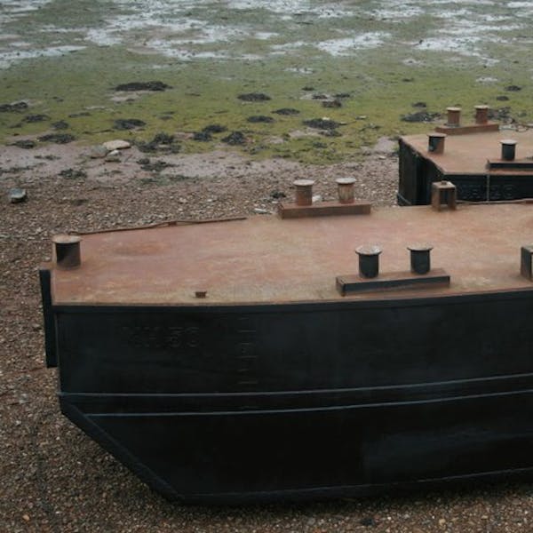 Painted and sand-blasted barges