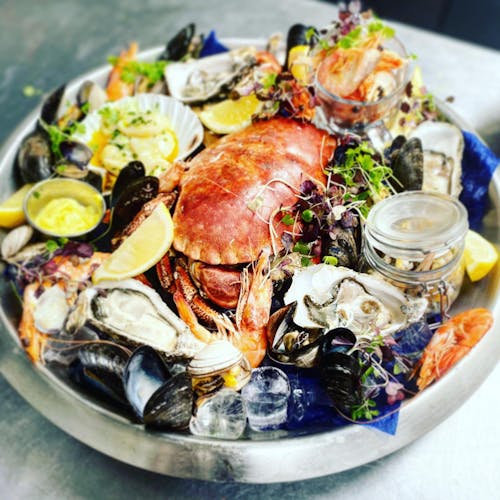 Neptune's platter - Oysters, mussels, whole crab, cockles, lemon… mmm…