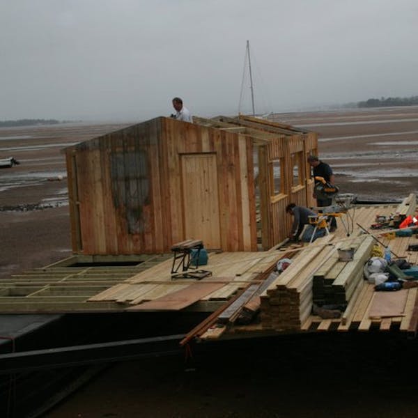 The café in progress with the main seating area under construction and the deck half finished