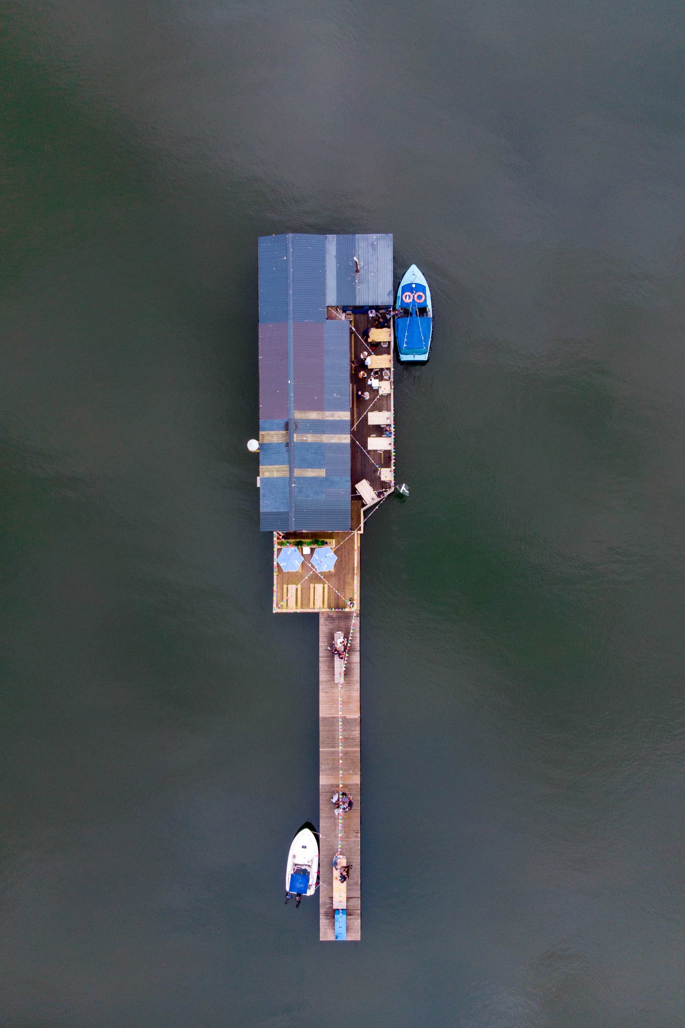 An aerial view of the River Exe Café and the pontoon with some moored boats