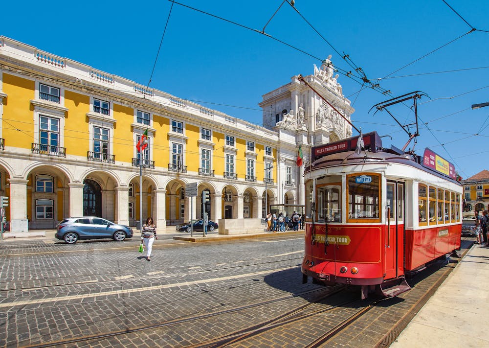 Overtake a tram by rental car in Portugal