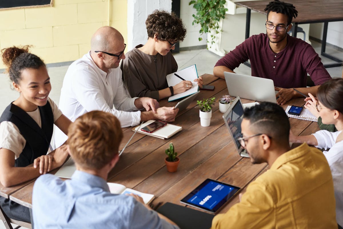 Happy employees working together in a meeting
