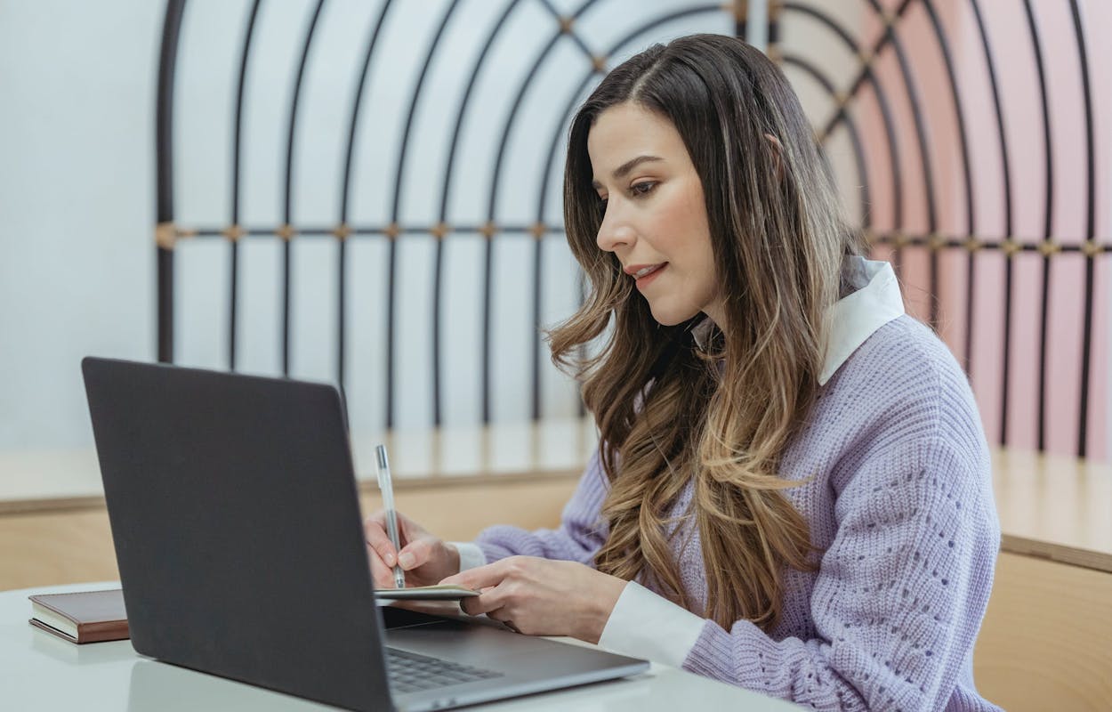 Woman taking a test on a laptop