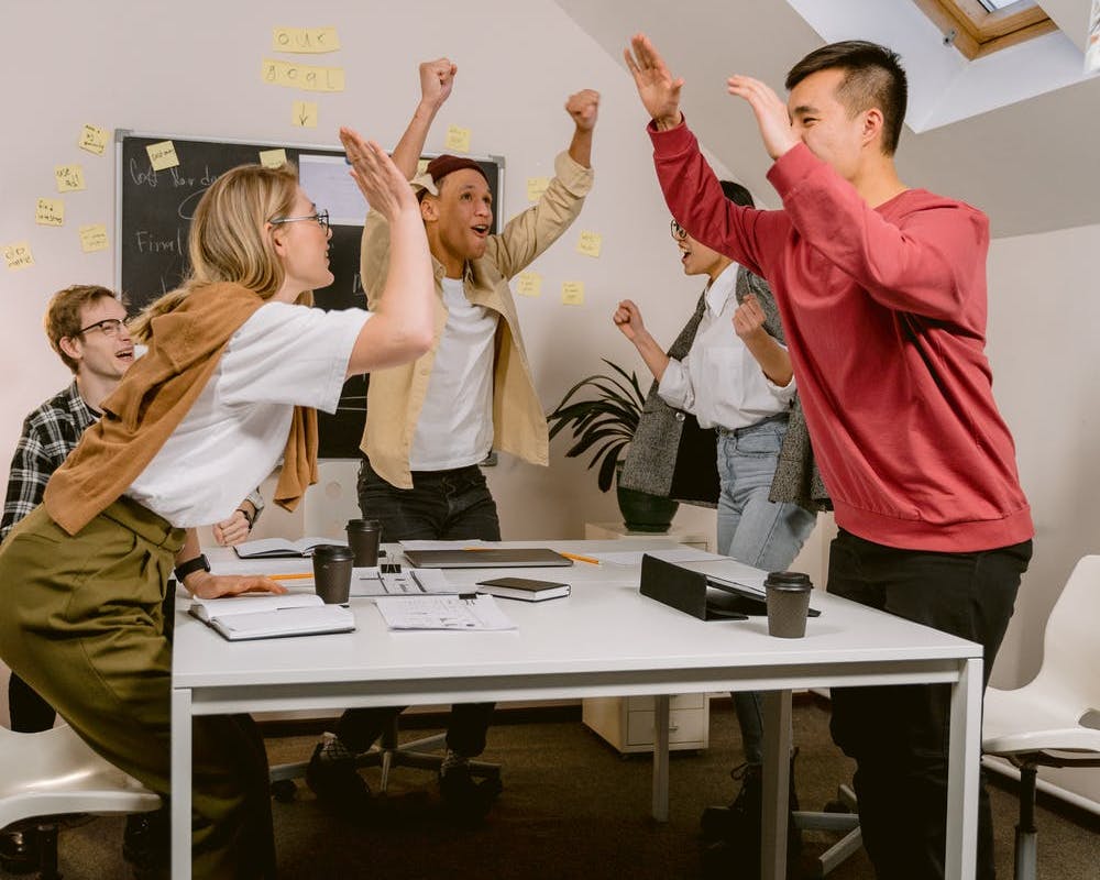 People celebrating in an office