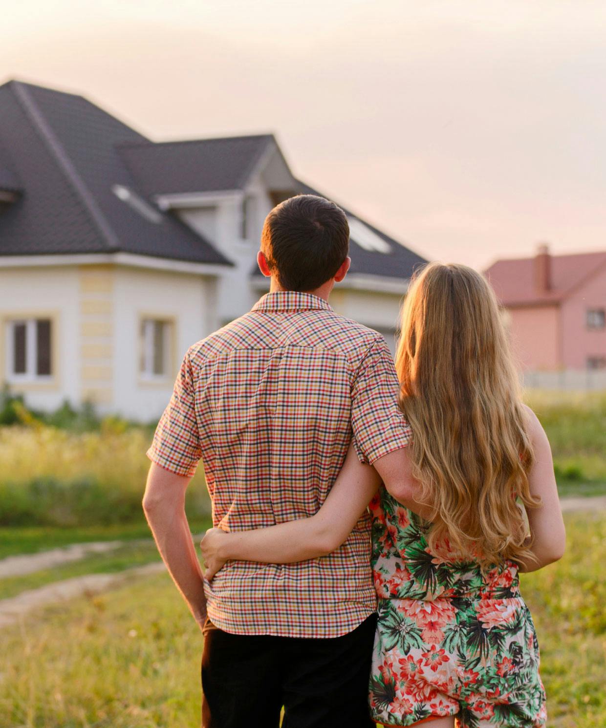 young couple looking at new home