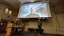 richard and james in front of a screen