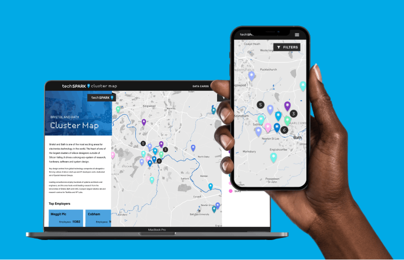 Laptop and phone showing the TechSPARK cluster map designed by Rocketmakers