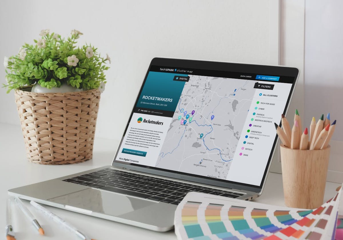 Laptop showing the TechSPARK cluster map designed by Rocketmakers