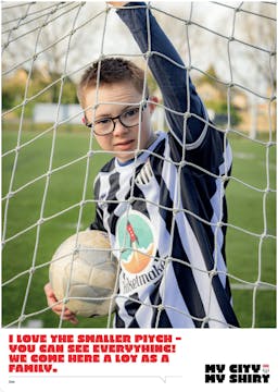 boy wearing football shirt