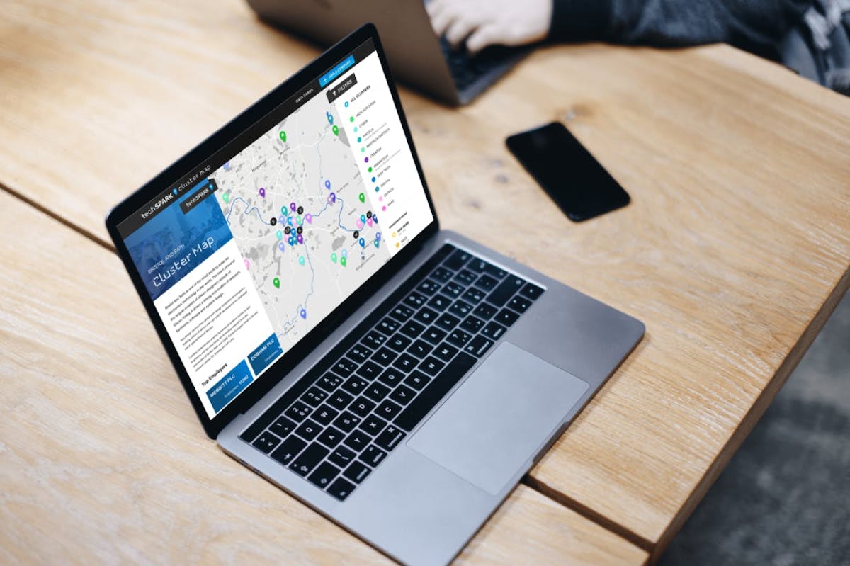 Laptop showing the TechSPARK cluster map designed by Rocketmakers