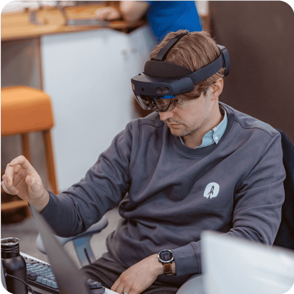 photo of Adam Walker using a VR headset