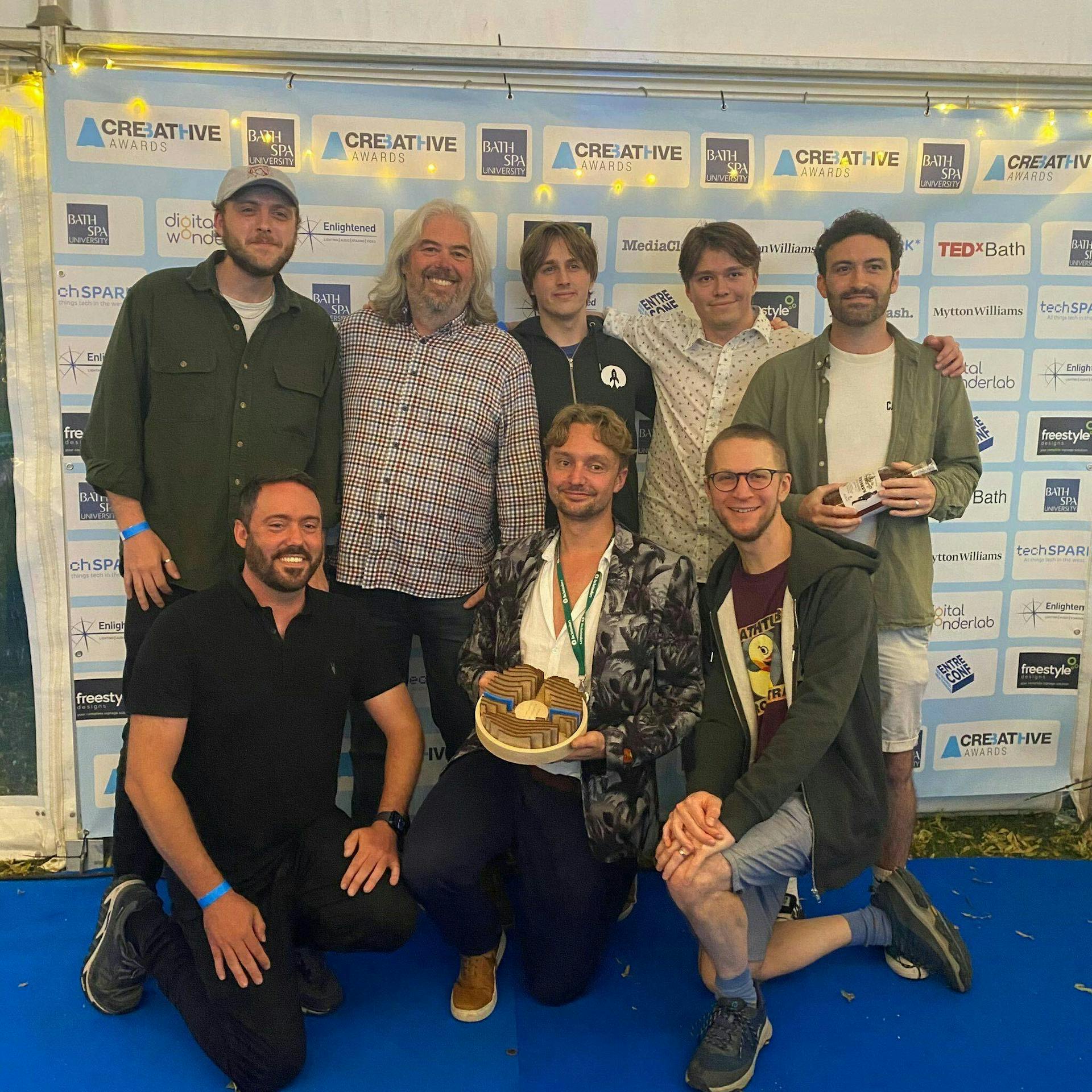 team at awards ceremony