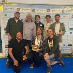 team at awards ceremony