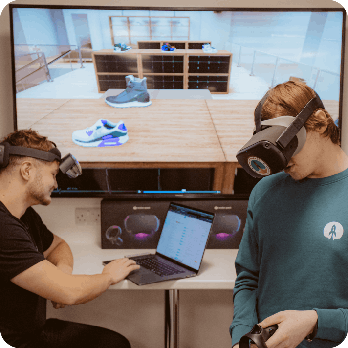 Two people working in VR