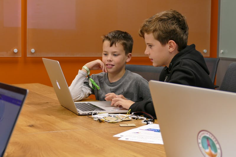 Boys working on computer