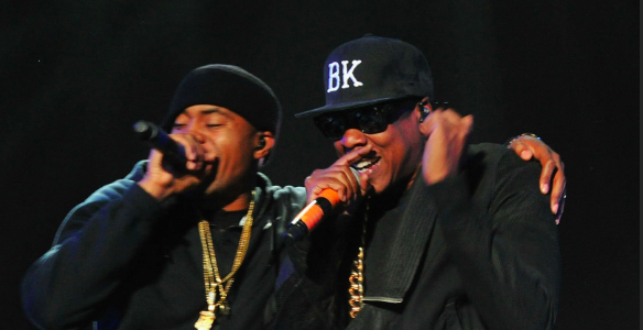 INDIO, CA - APRIL 12: Rappers Nas (L) and Jay-Z perform onstage during day 2 of the 2014 Coachella Valley Music & Arts Festival at the Empire Polo Club on April 12, 2014 in Indio, California. 